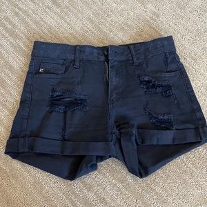 Black jean shorts (with rips as a design)